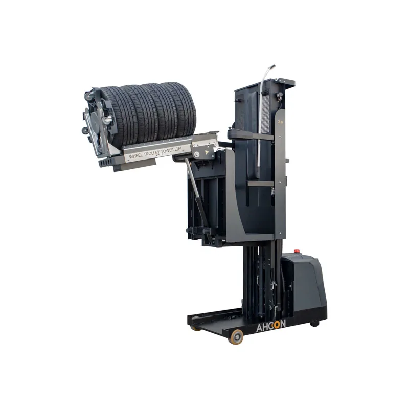 Tower Lift 2.0 mit ausgefahrenem Hubmast und angehobenem Transportwagen voller Reifen